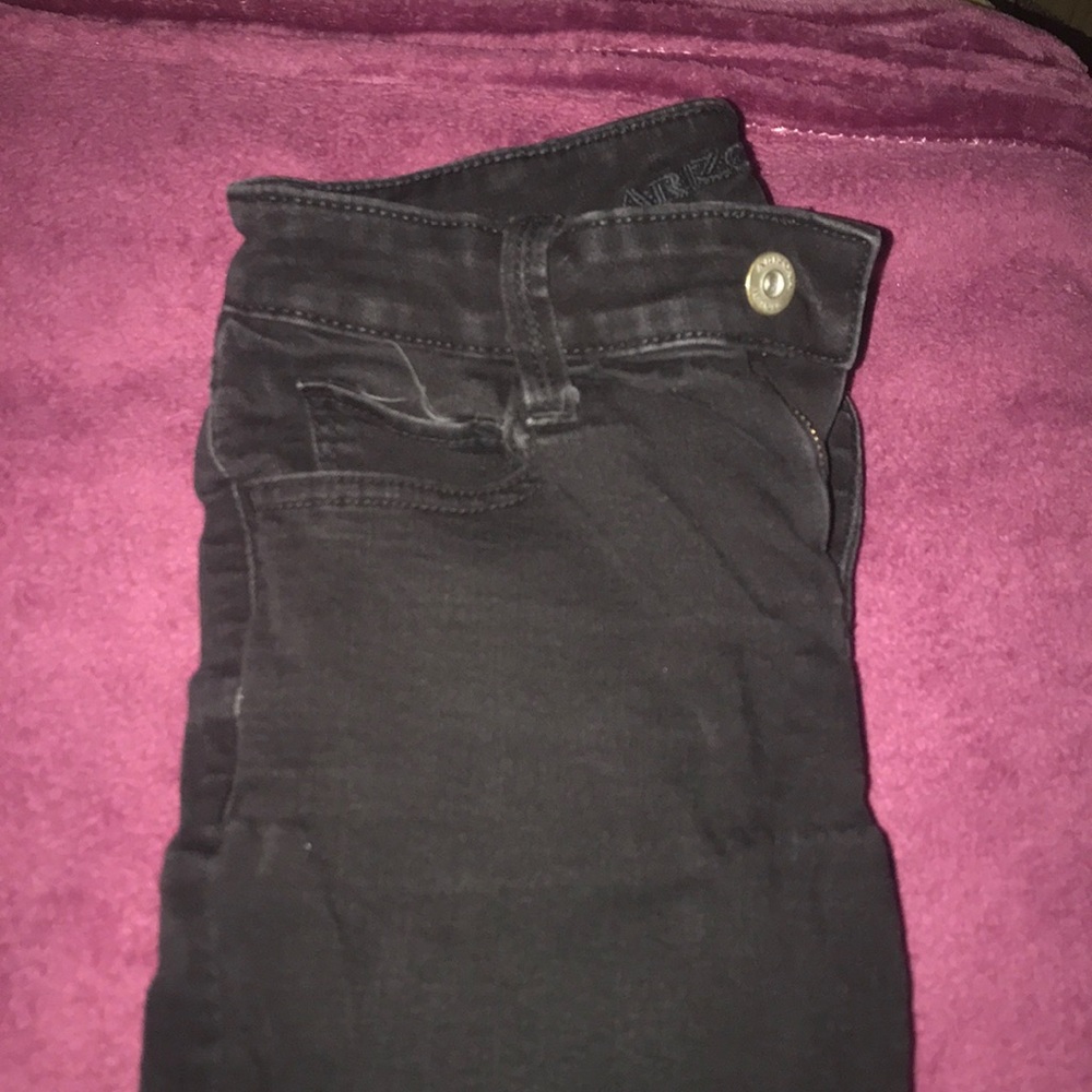 Black ripped jeans